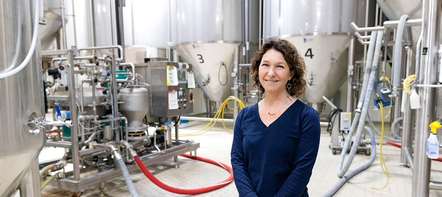 Paige Novak inside the brewing operation at Fulton